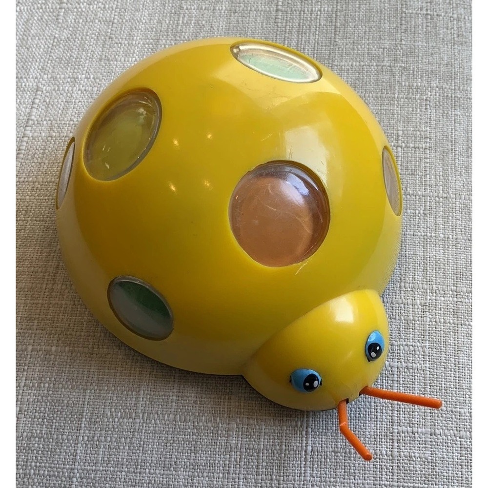 VINTAGE 1970s YELLOW LADYBUG Rolls With Friction MOTOR Child Guidance Toy